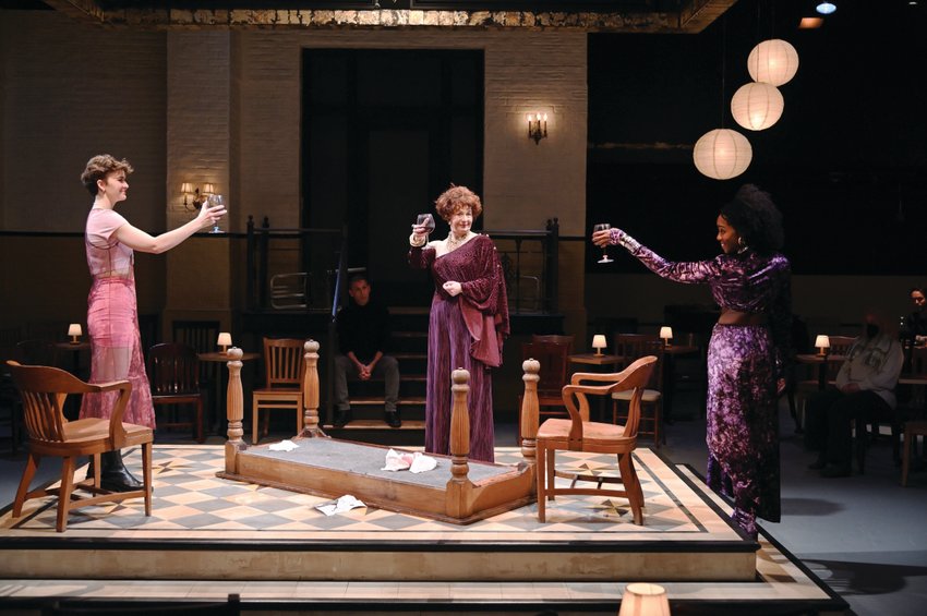 Fiona Marie Maquire as Margaret 1, Mauro Hartman (background) as Ensemble 3, Paula Plum as Margaret 3, and Rachel Christopher as Margaret 2 in Trinity Rep&rsquo;s production of &lsquo;By the Queen.&rsquo;
