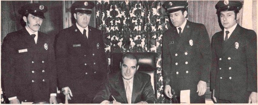 FOUNDING FATHERS: Signing Local 1950&rsquo;s fist Collective Bargaining Agreement with the Town of Johnston were, from left, Secretary-Treasurer William Almeida, Vice President Stanley Heywood, Town Administrator and later Mayor Ralph aRusso, President Clayton Quick and Richard DiBenedeto.
