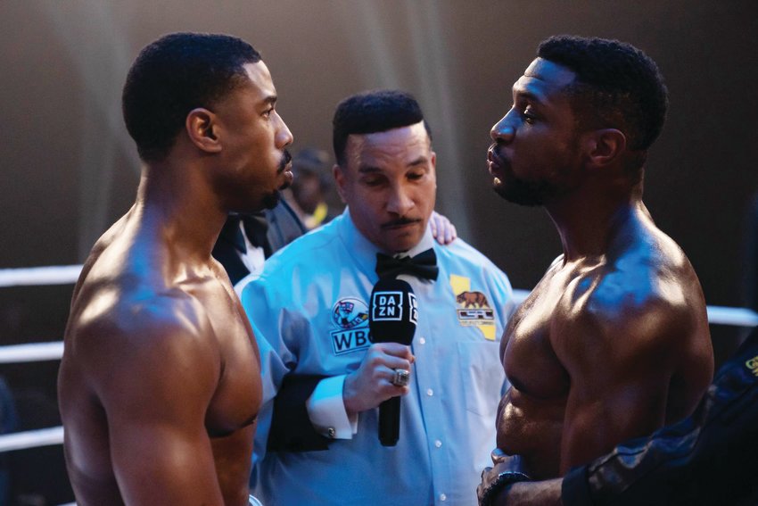 Michael B. Jordan (left) directed as well as stars in &quot;Creed III,&quot; in which he squares off with Jonathan Majors (right.