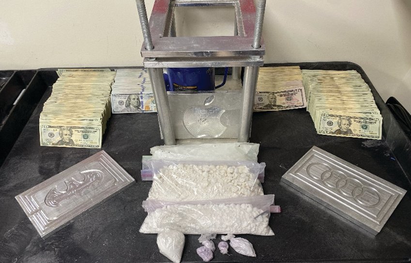 SEIZED: The following items were seized during the warrant searches at three separate locations (20 Metcalf Ave. in North Providence, 113 Sisson St. in Providence, and 716 Central Ave. in Johnston): kilogram presses, stamps, and molds; digital scales and packaging material for redistribution; 908 grams of Heroin; 229 grams of Fentanyl; and $82,550 in US Currency.