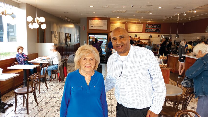 A HELPING HAND: Bernadette Conte stands beside Director of Economic Development Franklin Paulino as they work together to fund a documentary covering the history of Knightsville. (Photo by Ed Kdonian)