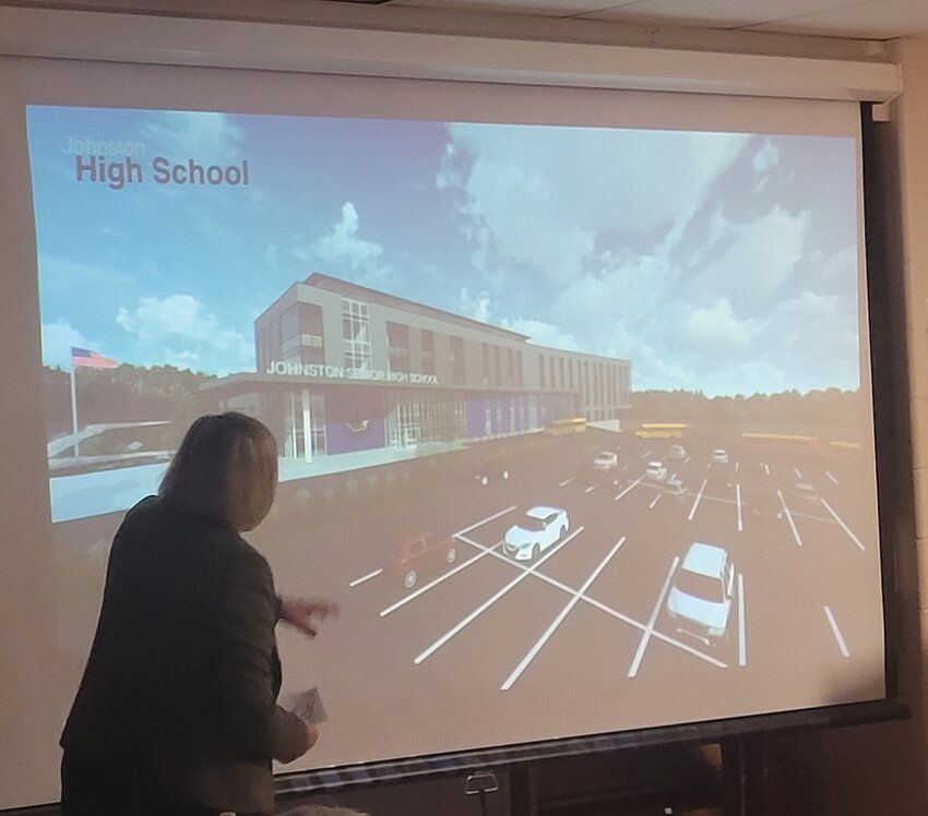 NEW JHS: Cathie Ellithorpe, Principal of the SLAM Collaborative, unveils the earliest renderings of a planned new Johnston High School.