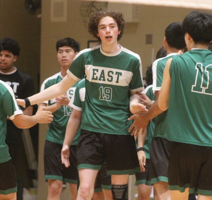 GETTING THE WIN: Cranston East&rsquo;s Jackson Rennick celebrates with teammates after winning a set last week against Bishop Hendricken. (Photos by Alex Sponseller)