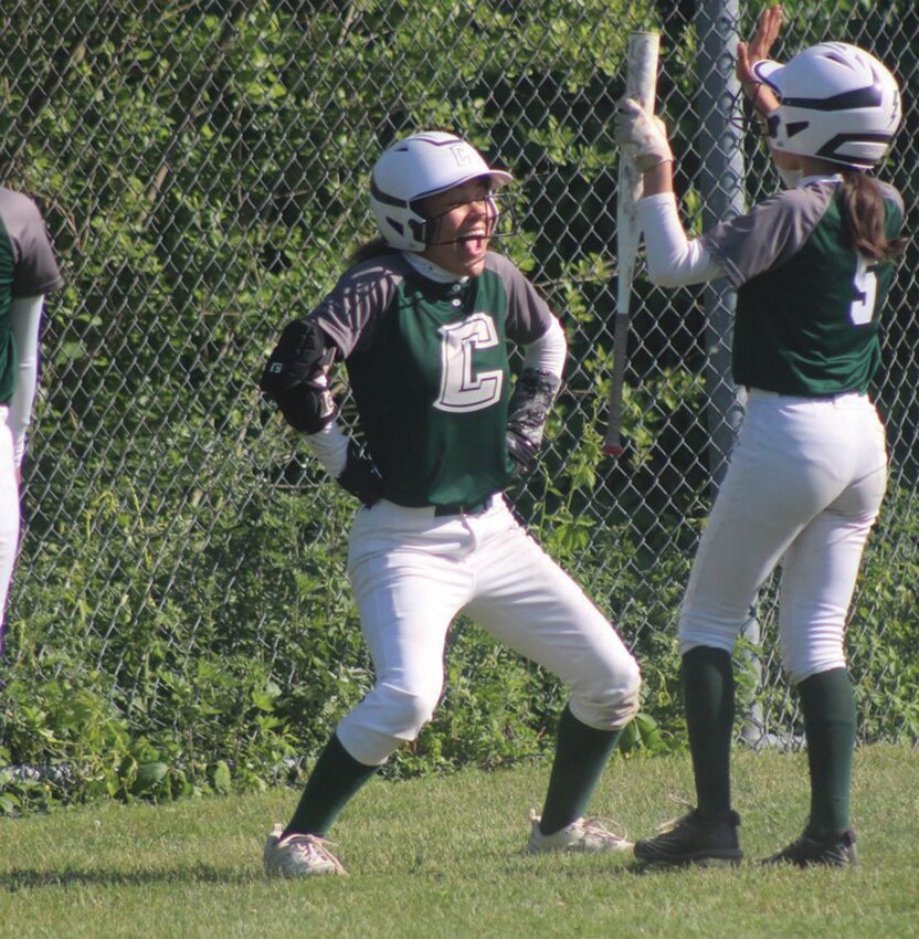 HOME RUN: Cranston East&rsquo;s Nevaeh Fatorma celebrates after hitting a home run against Davies last week in the Division III play-in game. Fatorma finished the game with four hits and three runs batted in. (Photos by Alex Sponseller)