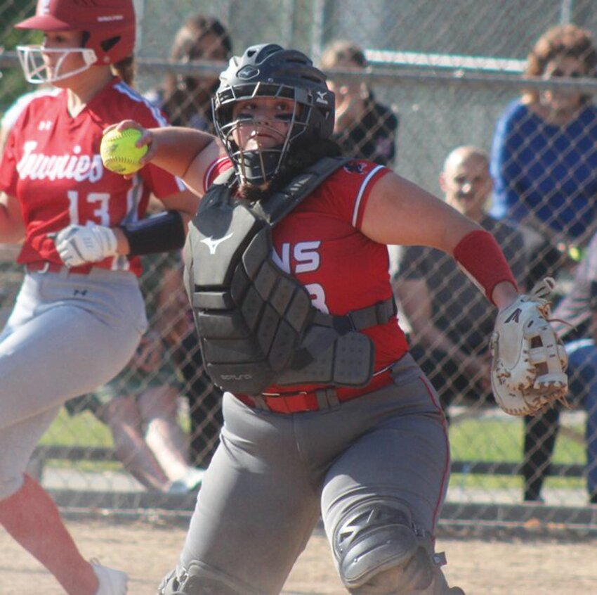 PLAYOFF ACTION: West catcher Sofia Marella makes a play against East Providence. (Photos by Alex Sponseller)