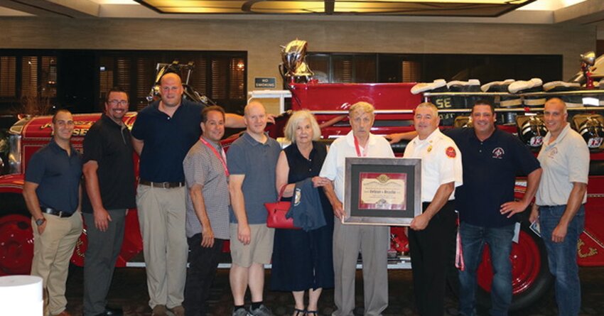 JFD WINS: The Johnston Fire Department accepted SPAAMFAA&rsquo;s prestigious National Preservation Award from Richard Quetta, a North Providence resident and president of the Rhode Island Antique Fire Apparatus Society last week at the Crowne Plaza Hotel in Warwick.