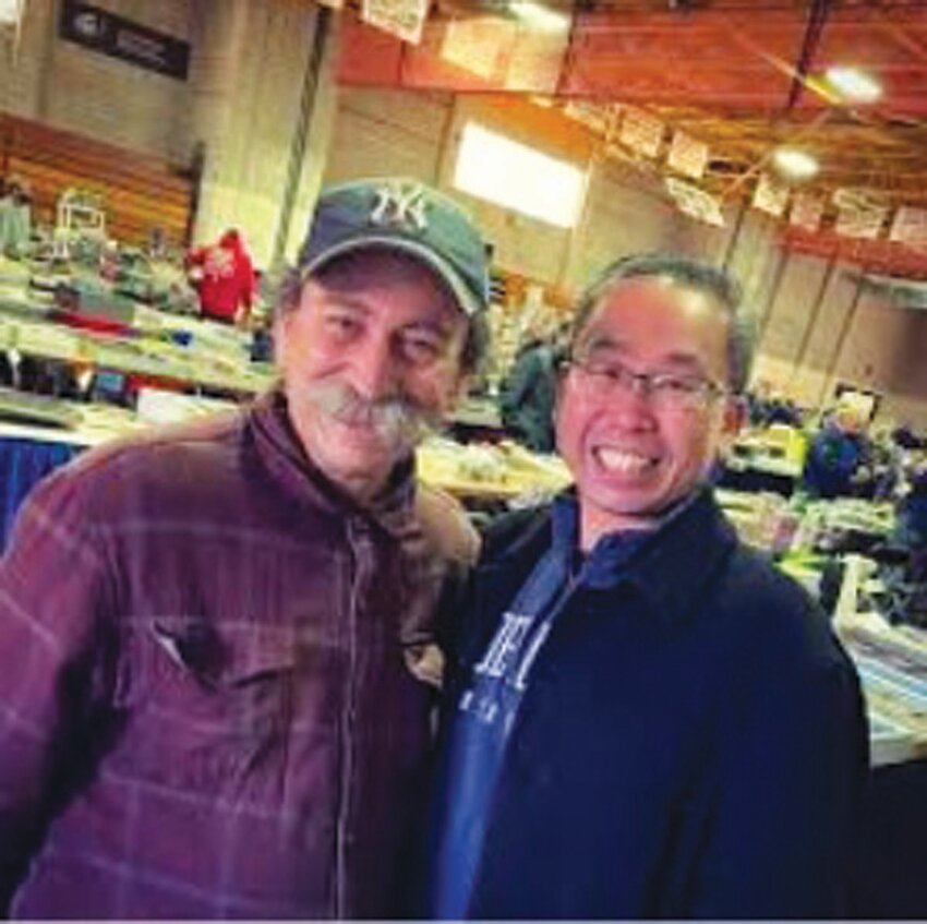 FAMILIAR FACES: Longtime collector and former Cranston Mayor Allan Fung is all smiles with promoter Mike Mangasarian at a past Cranston Sports Card Show.