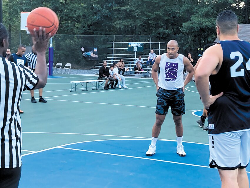 THE GAME&rsquo;S MENTAL SIDE: East Providence firefighter Edson Evora, playing with the Rhode Island State Police team, prepares to shoot a free throw.