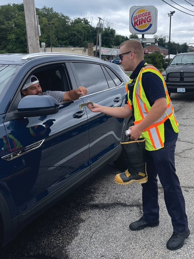 THANK YOU &hellip;. THANK YOU: That&rsquo;s what Johnston Firefighters like Tyler McNulty said to motorists on successive weekends when Local 1950 collected $14,000 for MDA through the nationally famous Fill the Boot program.