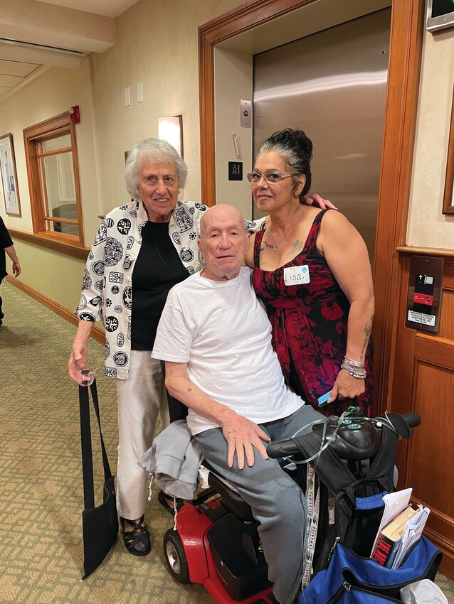 CRANSTON IN THE HOUSE: Seena Dittelman and Harry Finkelstein are joined by Lisa Marie Carbone at the Tamarisk anniversary party.
