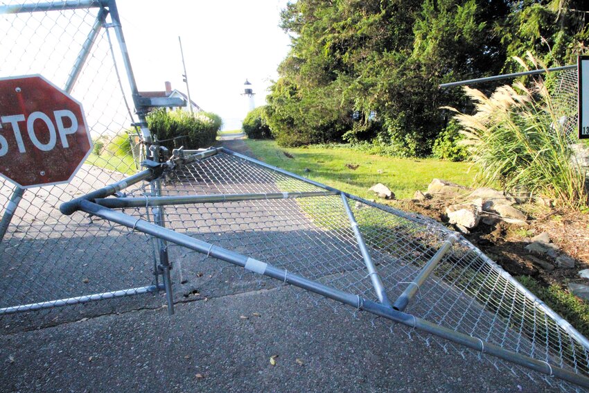 LAST STOP BEFORE THE LIGHTHOUSE: A motorist crashed through the fence at the end of Warwick Neck Avenue last Wednesday ironically shortly before a meeting of the Warwick Neck Improvement Association where speeding on the road was a topic of concern. (Warwick Beacon photo)