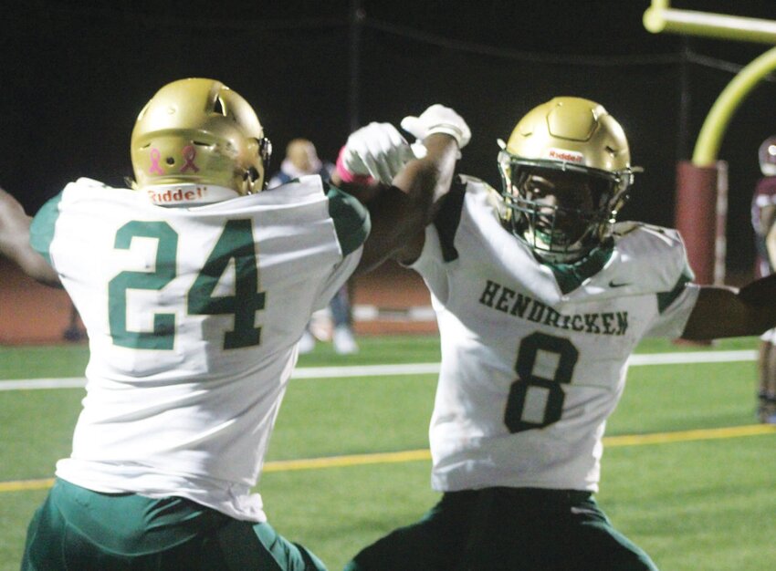 RUNNING TO THE WIN: Bishop Hendricken running backs Oscar Weah (8) and Ronjai Francis celebrate after the former rushed for a touchdown in the second quarter of last week&rsquo;s state championship rematch against rival La Salle. Weah finished with three scores while the duo combined for over 200 yards on the ground. (Photos by Alex Sponseller)