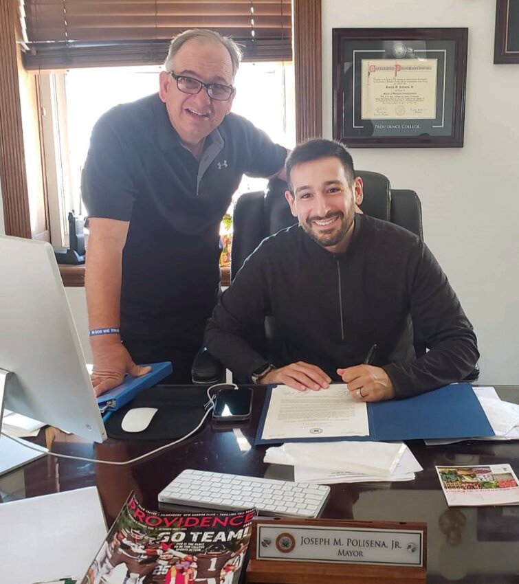 FROM JOHNSTON TO THE BOOT: Spirit of Hope founder Louis J. Spremulli poses with Johnston Mayor Joseph M. Polisena Jr. following their review of the &ldquo;Sister City&rdquo; agreement with Panni, Foggia, Italy.