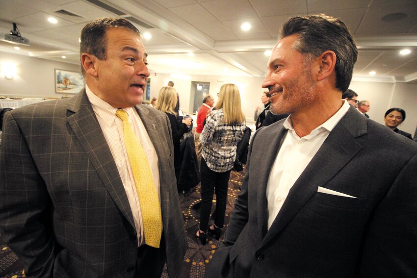 OPEN WIDE: More than 70 members of the Rhode Island dental community turned out Tuesday at a fundraiser for House Speaker K. Joseph Shekarchi at Chelo&rsquo;s in Warwick. Here, Shekarchi, left, talks with association president Dr. Frederick Hartman. The event raised more than $20,000. (Warwick Beacon photo)