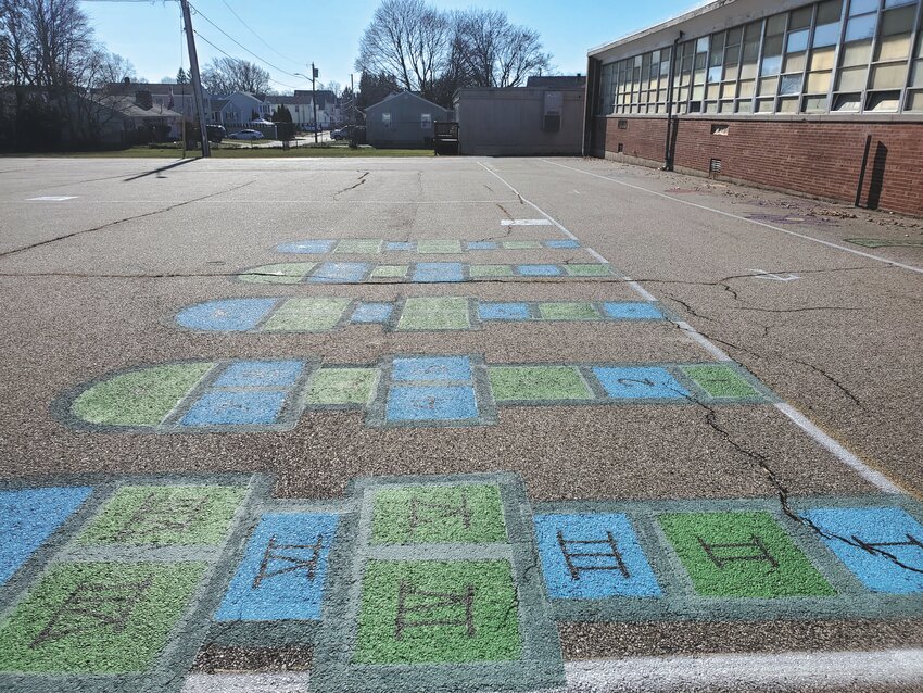 HOPSCOTCH TWO WAYS: One of Kevin Lamareux&rsquo;s paintings of blacktop games at Arlington, which helps kids learn to count in Arabic and roman numerals.