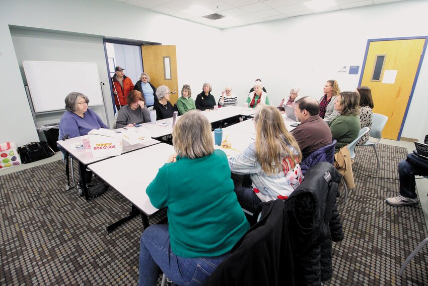 VILLAGE PEOPLE: Warwick residents interested in starting a Warwick Village filed into the library on Friday morning to discuss just what shape the final village would take. (Warwick Beacon photos)