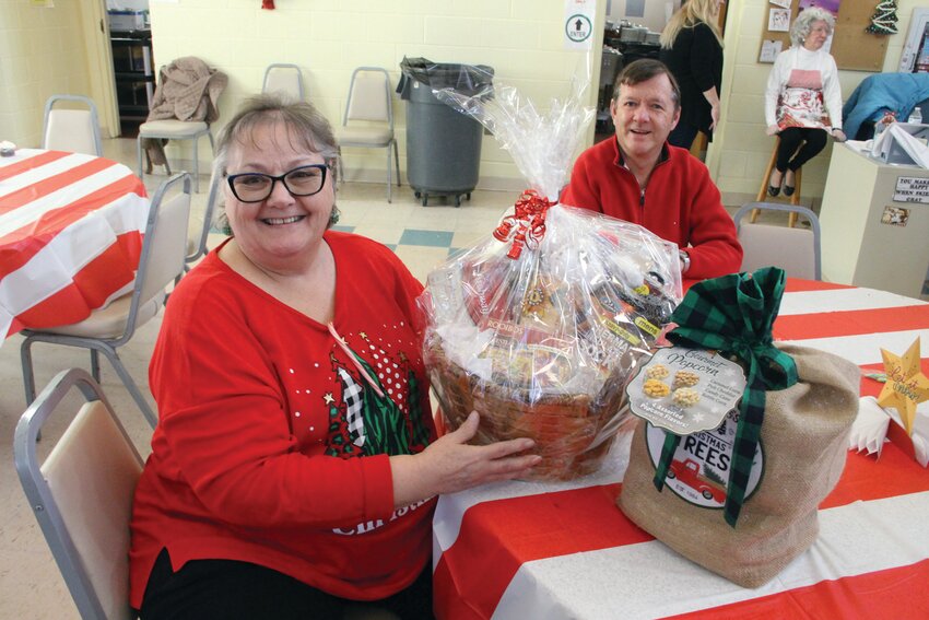HER LUCKY DAY: Jo-Ann Taft bought ten raffle tickets and to her surprise and delight won two prizes.