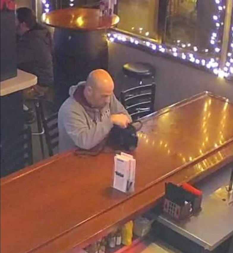 PURSE SNATCHED: The Warwick Police Department is seeking the public&rsquo;s assistance in identifying a man responsible for the theft of a patron&rsquo;s purse while dining at the Grid Iron Ale House &amp; Grill on Dec. 10, 2023. On Tuesday, Warwick Police posted these photos of the suspect. Anyone who recognizes the man in the photos should contact the Warwick Police Department Detective Division at 401-468-4233, or WPD Detective Adam Arico at 401-468-4267. (Photos courtesy Warwick Police)