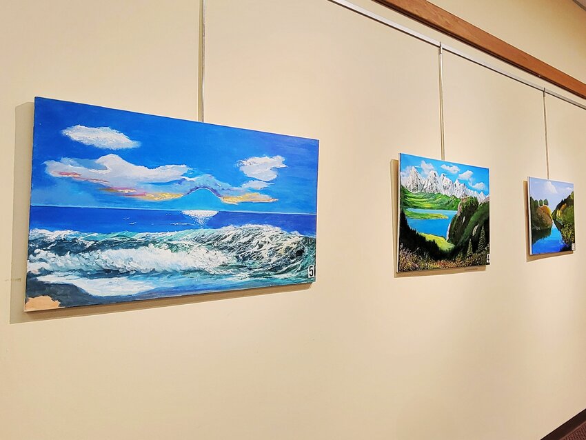 ENDLESS BLUE: Zhanat Baidaralin&rsquo;s paintings will be on display all of January at Cranston Central Library. (Photo provided by Cranston Public Library).