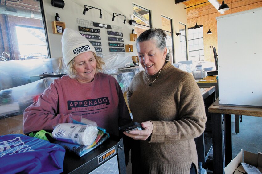 A RIVER CAN&rdquo;T STOP THEM: Kris Waugh and Tamara McKenney plan to have the Apponaug Brewing Company reopen this week despite being forced to close in December by flooding and then a second flood last week. (Warwick Beacon photos)