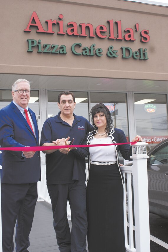 FINALLY PIZZA: Last week Arianella&rsquo;s Pizza Caf&eacute; &amp; Deli finally had its grand opening, a year after opening. The Mayor was in attendance, along with Cranston Economic Development Director Franklin Paulina to wish co-owners Eli and Angela well at the ribbon cutting ceremony. (Photo by Steve Popiel)