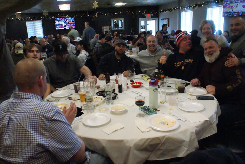 HUNGRY FOLKS: A table full of hungry diners at the Game Dinner. (Photos by Steve Popiel)