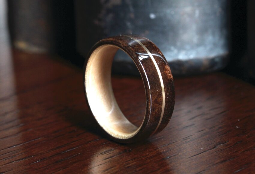 BRIGHT GOLD: Lincoln Pollock combines domestic wood with gold to unusual effect for a ring.