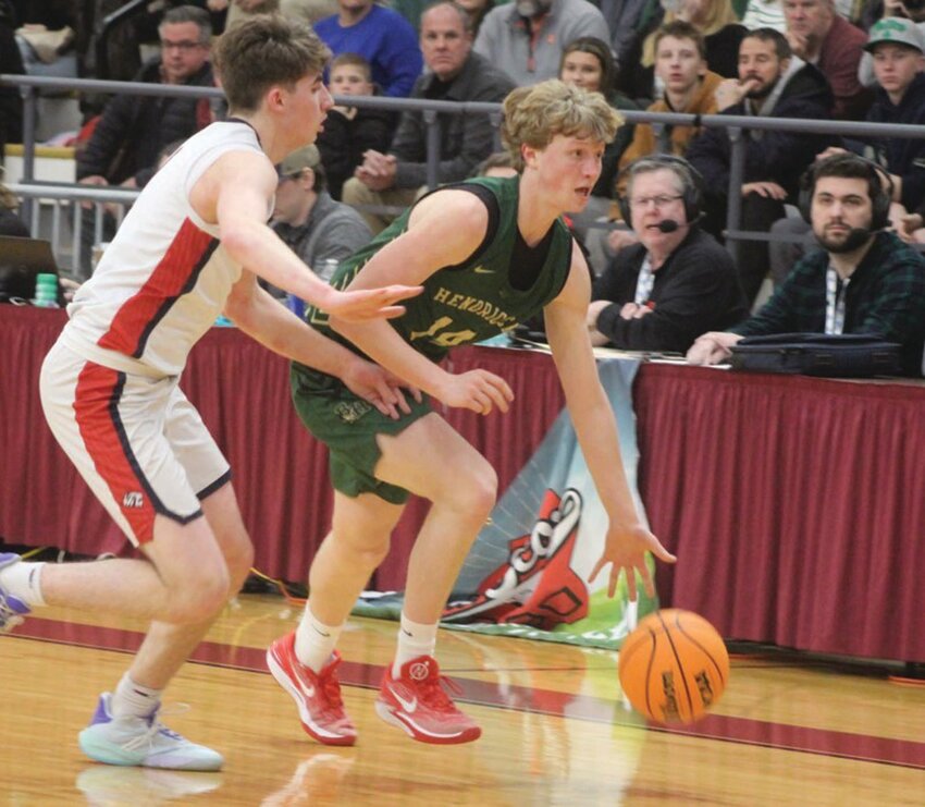 ELITE 8: Hendricken&rsquo;s Michael D&rsquo;Ambra takes the ball up the floor on Monday night. (Photos by Alex Sponseller)