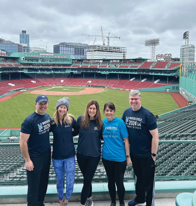 TEAM WE WILL: Members of Team We Will gather for a photo at Fenway Park last