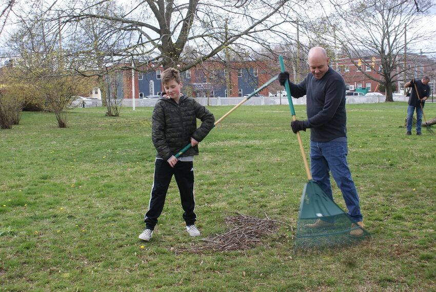 FATHER-SON: Nicholas Russo, a student at Immaculate Concept, got out to Sprague Mansion with his dad Mike to put in some hours into the school’s required community service hours.