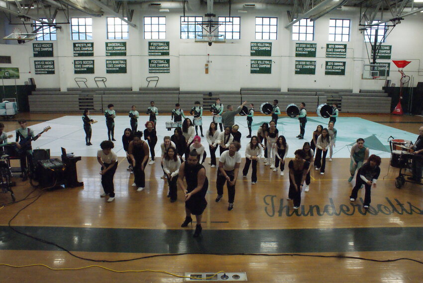 ON THEIR FEET: Matt Garza from House of Glitter performed a merengue, and a traditional Tejano folk song with the Cranston East Dance Team.