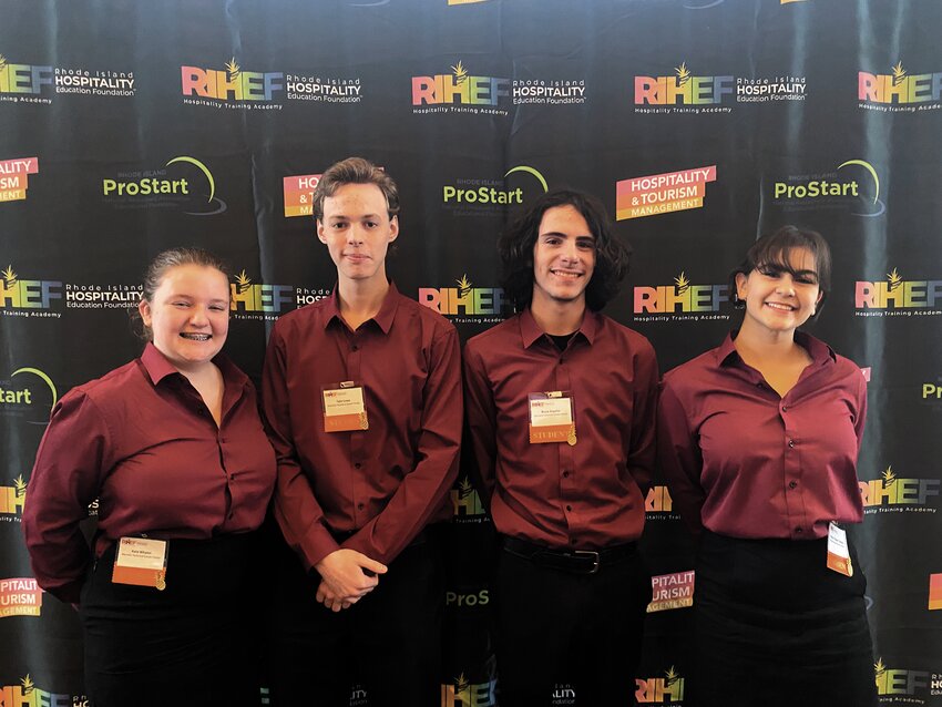 KITCHEN MAESTROS: (L-R) Kate Whelan, Tyler Lowe, Bruce Angelini and Harper Salinas pose for a team picture at the state Restaurant Management competition.