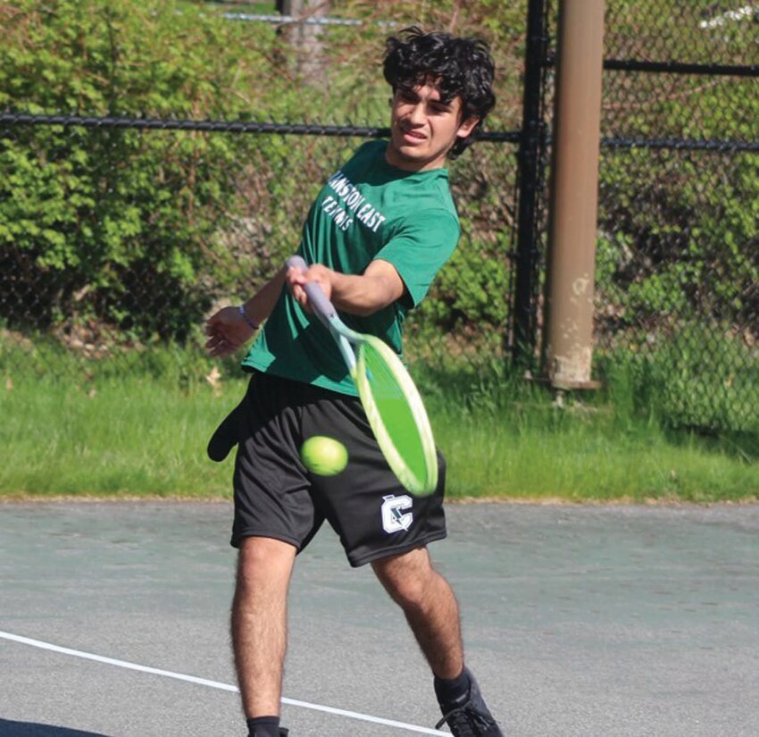 PLAYOFF READY: East’s Adrian Rosales Lopez returns a shot last week against Scituate.