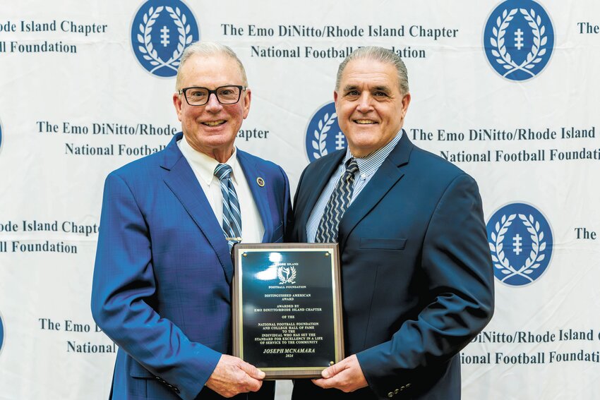 HONORED: Rep. Joseph McNamara receives the Distinguished American Award from Tom Centore of the Emo DiNitto/Rhode Island Chapter of the National Football Foundation and College Hall of Fame Monday night at the Crowne Plaza Hotel in Warwick.