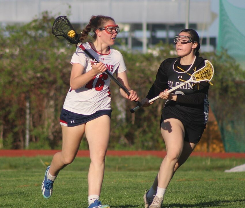 RIVALRY BATTLE: Toll Gate&rsquo;s Lucy Lajoie is chased by Pilgrim&rsquo;s Gracelynn Ferreira. (Photos by Alex Sponseller)