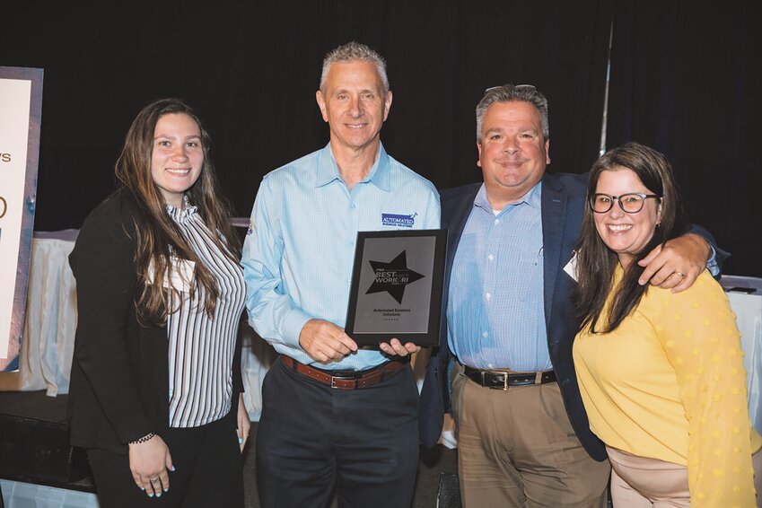 TEAM PLAYERS:  Jen Thomson, Vice President of Sales and Marketing and the first female vice president of ABS, at far right is joined from left by co-workers Lily Silveira, HR Coordinator; John Papa, Production Print Specialist; and David Aulisio, VP of Business Development. (Submitted photo)