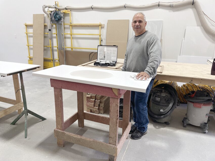 Meet Steve Calise, the owner and operator of Ocean State Top Shop, LLC in West Greenwich.&nbsp; He is seen here at his shop with some of the countless countertop options available for your home or business!
