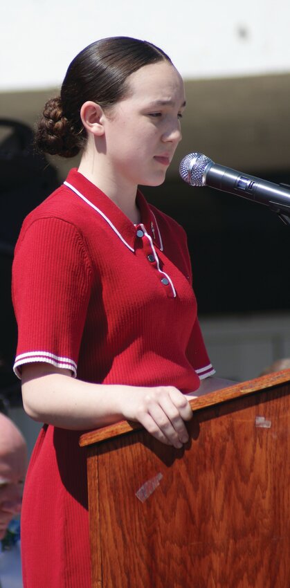 MOMENTS OF SILENCE: Student Abigail Farmer served as the Master of Ceremonies at the Park View Middle School Memorial Day Ceremony.