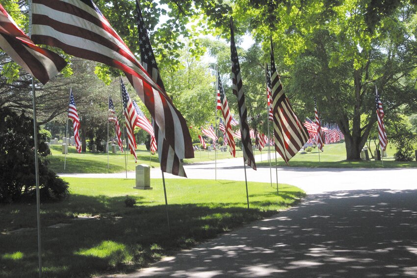 SO MANY VETERANS: As the Pawtuxet Memorial Park has done for years on Memorial Day weekend, flags representing more than 300 veterans buried at the park lined cemetery roads. (Warwick Beacon photos)