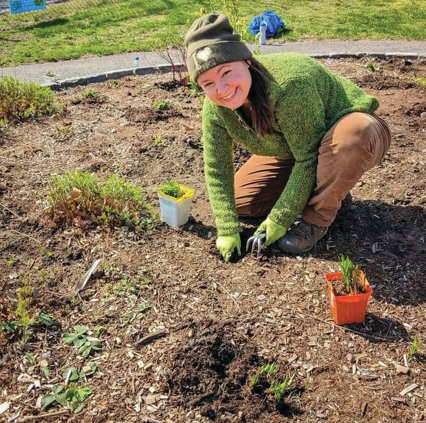 GUILLET GARDENS: Melissa Guillet, creative director of 15 Minute Field Trips, plants a garden on a sunny day.