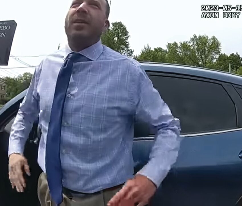 FAST FALL: Ex-Ward 6 Cranston City Councilman Matthew Reilly was arrested on drug charges on May 15, 2023, after police found him asleep behind the wheel. Last week, the AG’s Office announced the resigned councilor has been indicted on multiple child molestation counts. This image is a screenshot from the body-worn camera footage from the arresting officer during Reilly’s first arrest. Just weeks later, he was arrested again, on child molestation charges (that ultimately yielded last week’s Providence County Grand Jury indictments.