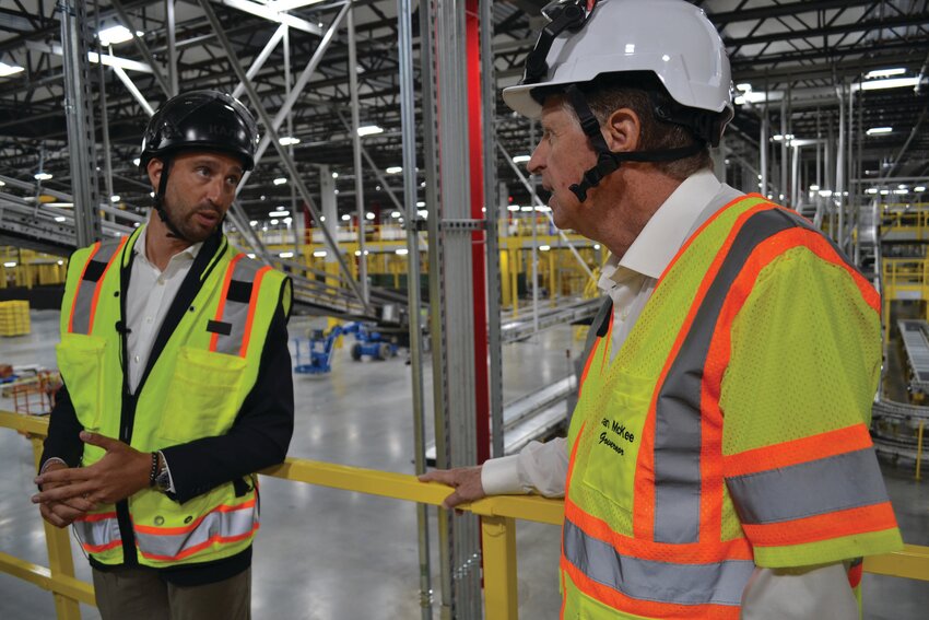 WE ROBOTS: Rhode Island Gov. Dan McKee toured the Amazon robotics sortable fulfillment center in Johnston, which has yet to open. According to an Amazon spokesman, the giant building should be kicking into gear by the holiday season. Floors two through five of the facility (the size of approximately 66 football fields), are packed with small blue robots.