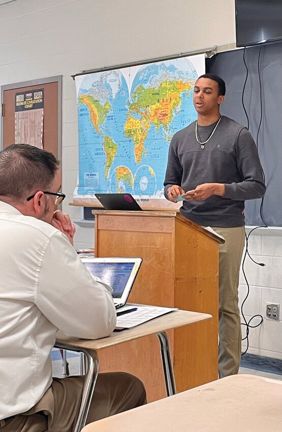 GLOBAL PERSPECTIVE: NeAri Vasquez presents his project to end the semester.